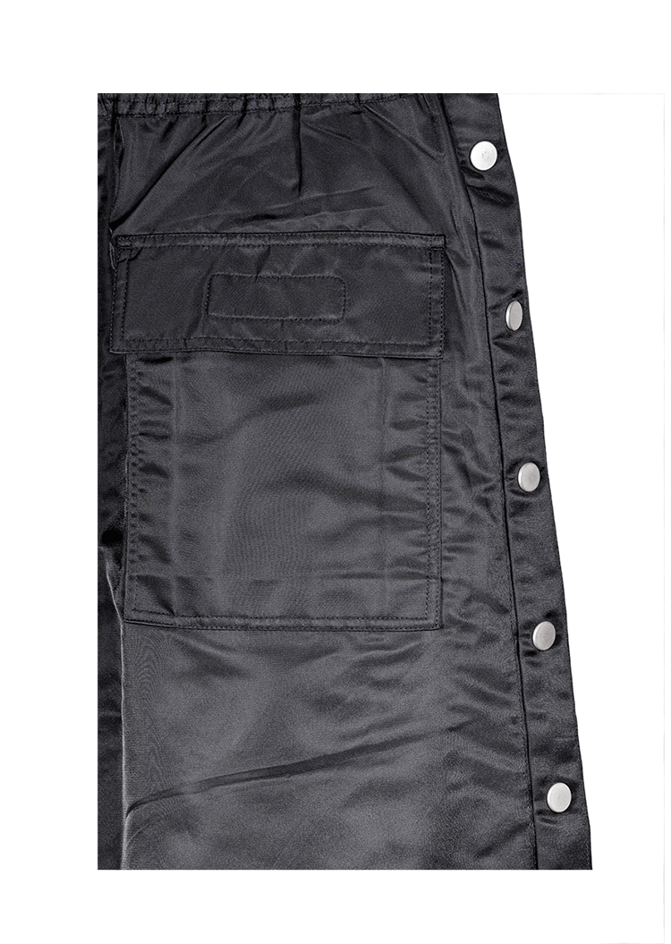 Pantalones rectos con botonadura oscura y cintura elástica