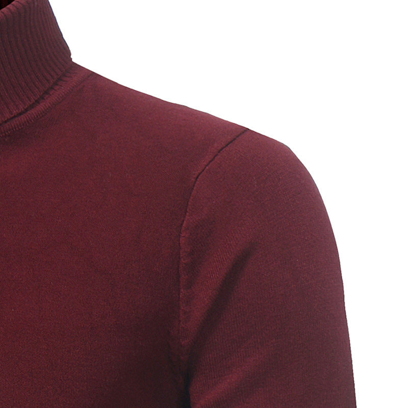 Maglione slim fit con risvolto alto e fondo a costine