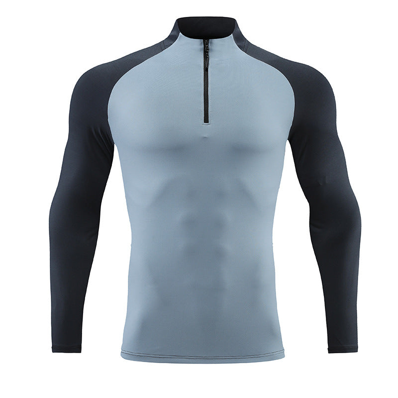 Camiseta deportiva de color liso con media cremallera y cuello simulado para hombre