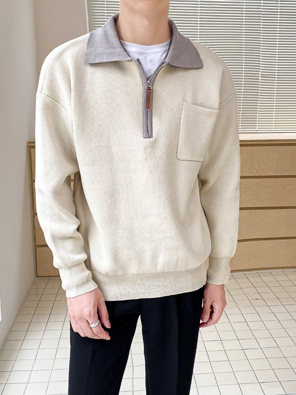 Suéter holgado con cuello tipo polo y media cremallera para hombre