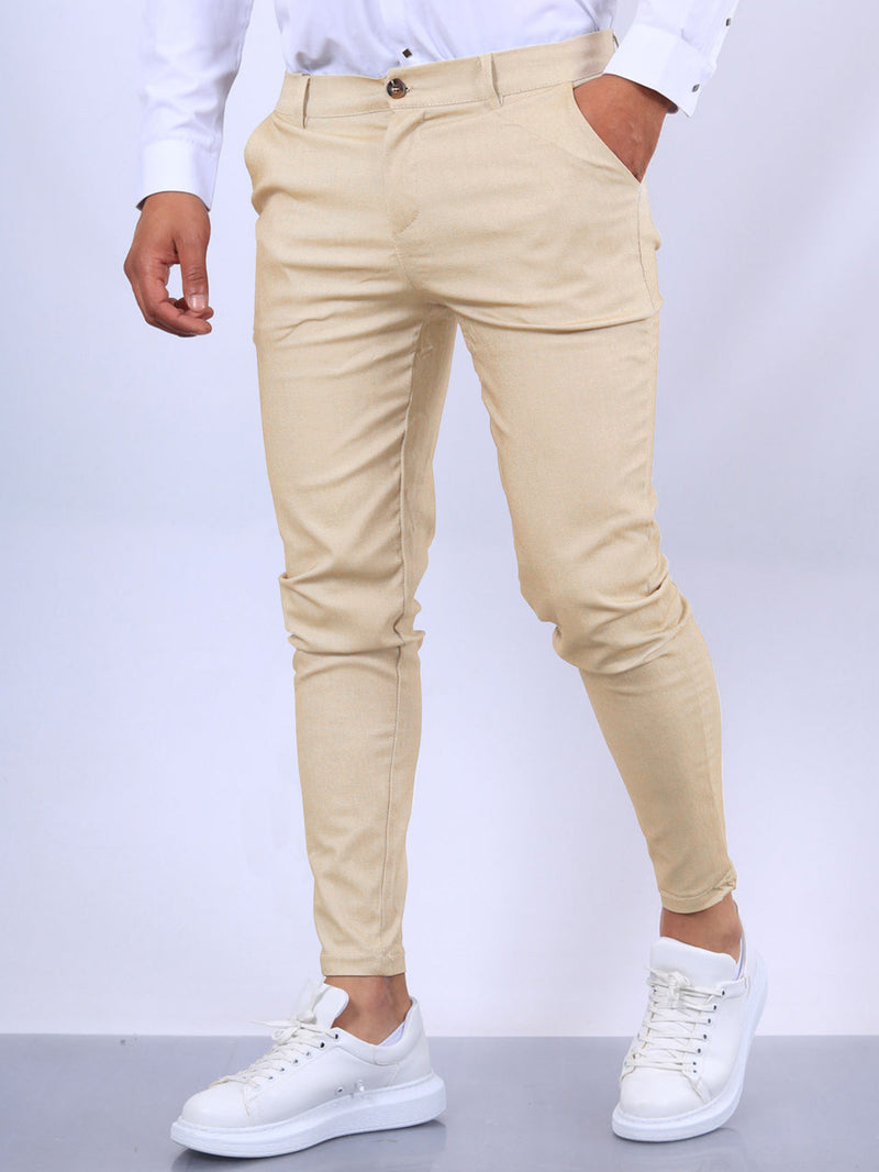 Pantalones tapered casuales con textura de color liso