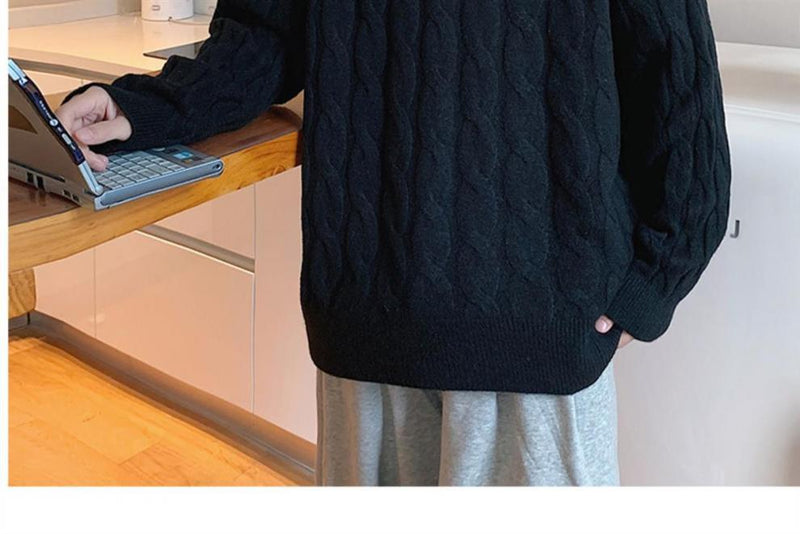 Suéter tejido a mano con cuello redondo y base suelta