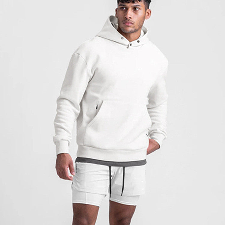 Pull à capuche en polaire ample de couleur unie pour homme