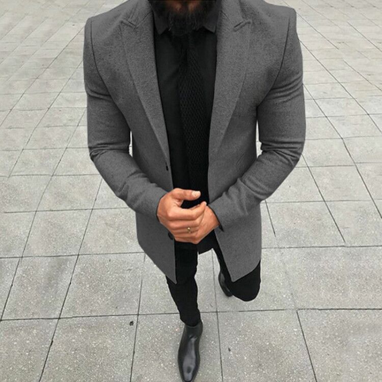 Chaqueta formal de hombre de manga larga de color liso. 