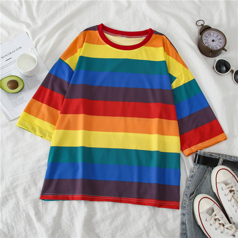 Suéter suelto con capucha de rayas arcoíris 