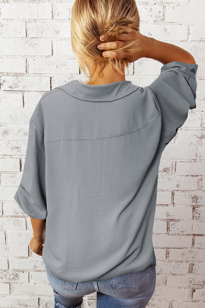 Blusa texturizada de manga tres cuartos con cuello Johnny