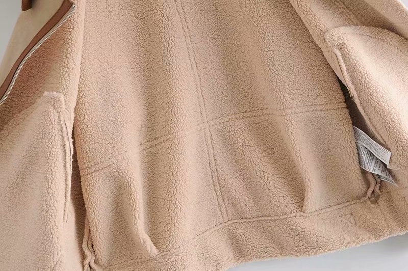 Chaqueta con cremallera y costuras simples para mujer